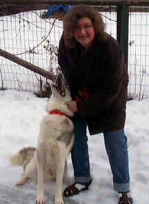 'Angel' is howling happy with Brenda.  Angel was a stray turned into rescue.