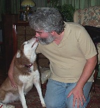 Maggie finds a new best friend with John.  Even with one eye lost to Galucoma, Maggie has lots of love to give. 